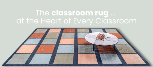 Elizabeth Richards classroom rug with square colours being sat on by two children reading